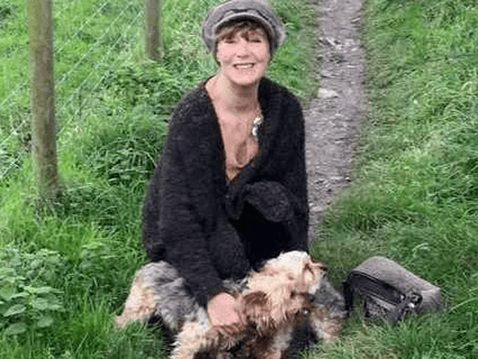 Vanessa with a dog in the Woolmers paddock